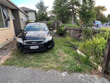 Two homes' garages separating two homes. - Photo 3