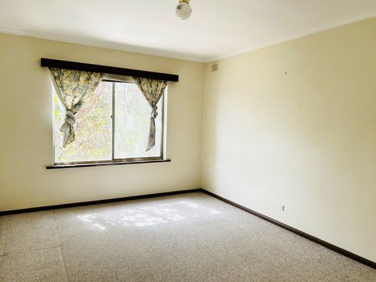 Charming 2-Bedroom Unit with Classic Appeal - Photo 1