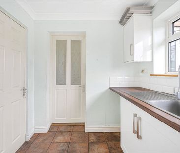 A 3 bedroom bungalow with a large garage and driveway parking in We... - Photo 3