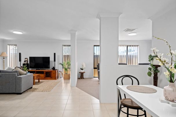 Immaculate 4x2 Family Home with Multiple Living Areas - Photo 1