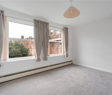 A newly decorated top floor apartment offering light and spacious a... - Photo 6