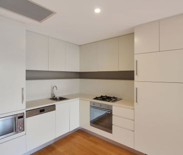 North Facing Bedroom with New Appliances and Floorboards! - Photo 6