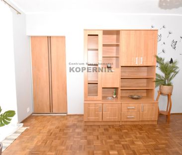 Toruń, Bażyńskich Wyjątkowo duża kawalerka 38, 59 m² | Balkon | Gar... - Фото 5