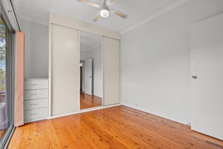 Conveniently Located Cottage with Captivating Water Views - Photo 3