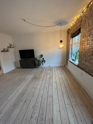 Hyggelig 2-værelses lejlighed med New Yorker-væg - Photo 1