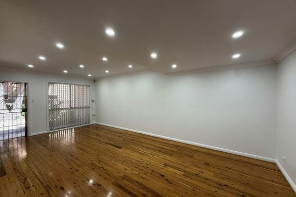 NEWLY RENOVATED TOWNHOUSE - Photo 1