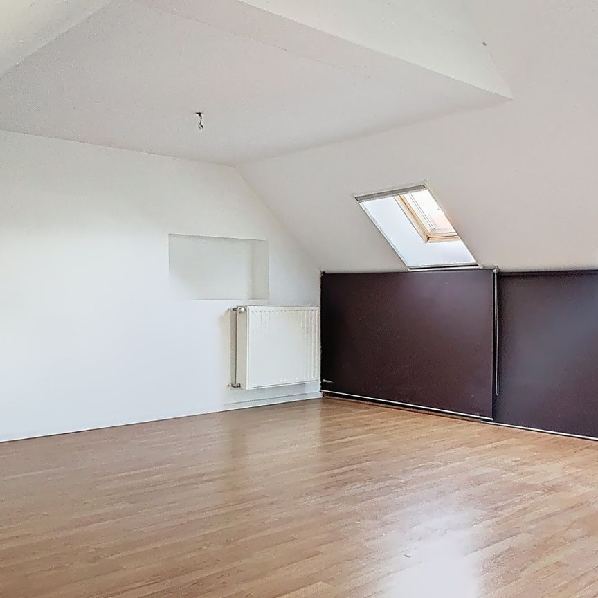 Gezellige halfopen woning met tuin te Bree - Photo 1