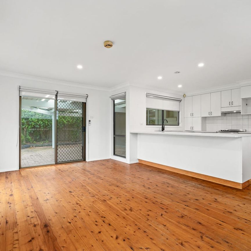 SPACIOUS FAMILY HOME IN A QUIET CHARMHAVEN LOCATION - Photo 1