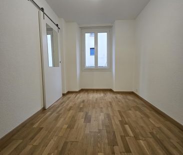 Quartier sous-gare : charmant appartement de 2.5 pièces au rez - Foto 2