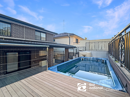 Spacious 4-Bedroom + Study Duplex with Swim Spa in Georges Hall - Photo 4