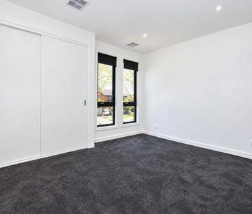 Ideally positioned in a peaceful, treelined setting, this 4 bedroom home offers generous space, comfort and functionality for modern living - Photo 1