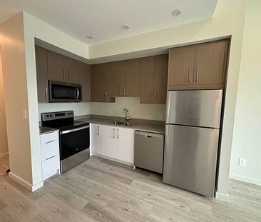 NEW UPTOWN RESIDENCES (1BR/1 Bath w/Den) - Photo 1