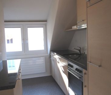 Dachwohnung - Wohnliche Behaglichkeit in Stadtnähe - Photo 1