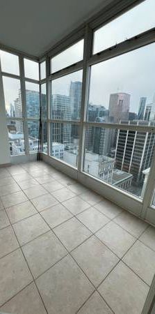 Ocean View Downtown 1BR + Solarium for Rent - Photo 1