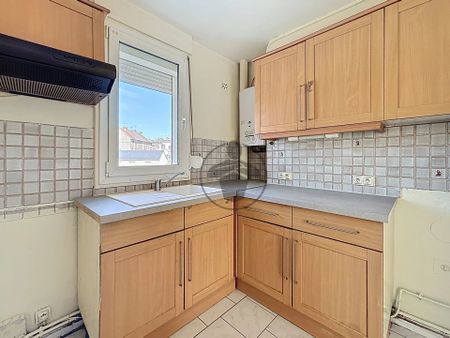 Location Appartement 4 pièces 66 m2 à Saint-Quentin - Photo 4