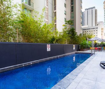 Fully Furnished CBD Apartment with Large Study – Resort-Style Facil... - Photo 6