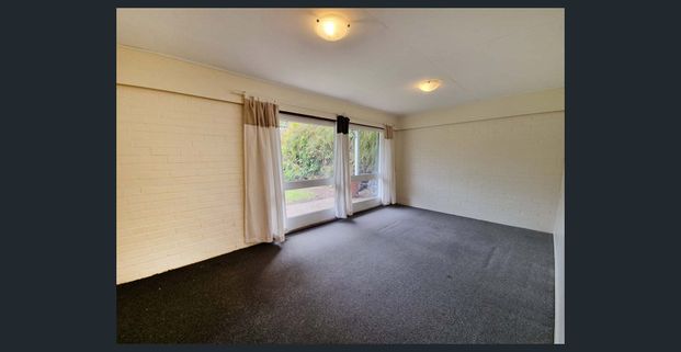 Experience Affordable Comfort in the Entire Lower Level at 4 Lanark St, Kenmore - Photo 1