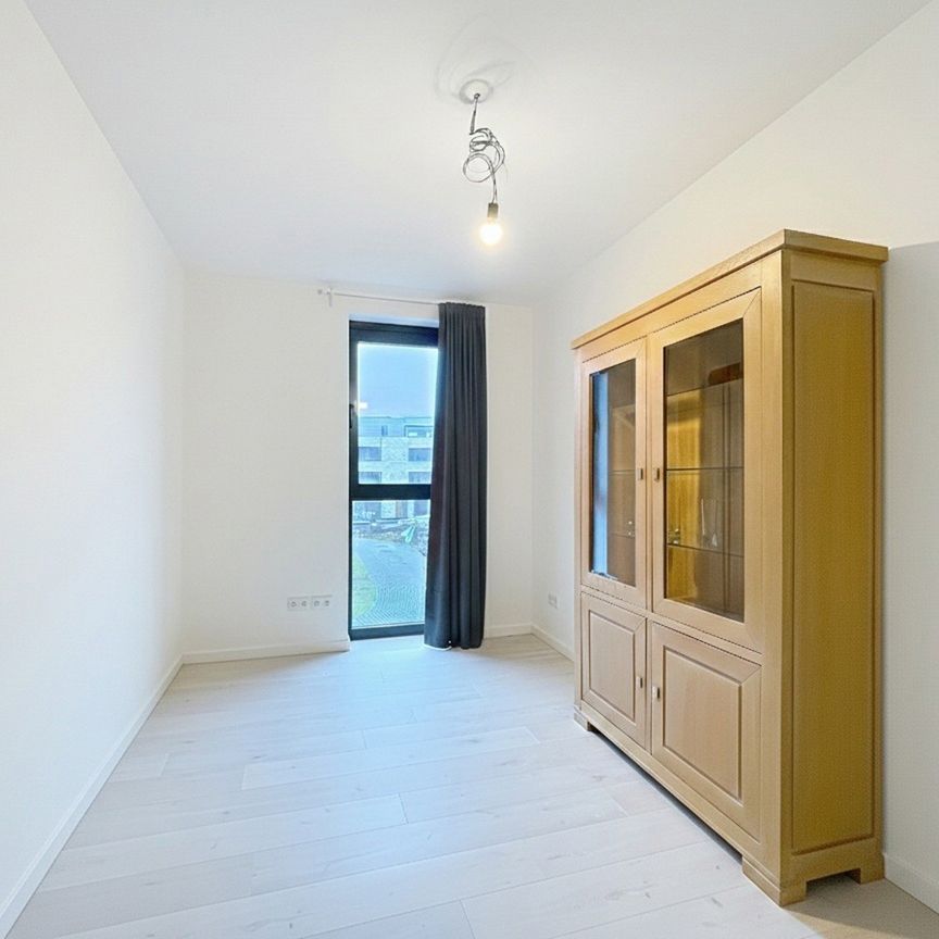 Appartement op de eerste verdieping met autostaanplaats en kelderberging - Photo 1