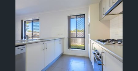 Modern Family Home with Spacious Design & Energy Savings - Photo 4