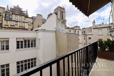 Duplex avec terrasse - Ile de la Cité - Photo 2