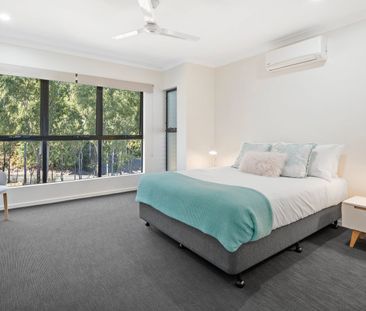 Modern Three-Bedroom Townhouse in a Sought-After Coastal Location - Photo 6