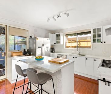 Comfortable Family Home with Light-Filled Living - Photo 4