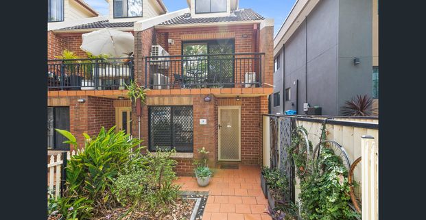 Three-Level Townhouse with Study & Tandem Garage - Discount to Market - Photo 1