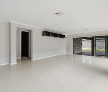 Spacious Family Home with Multiple Living Areas - Photo 1