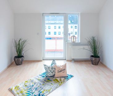 Ruhig gelegene 2-Raum-Wohnung mit Einbauküche - Photo 4