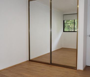 SPACIOUS TWO BEDROOM UNIT IN CONVENIENT LOCATION - Photo 5