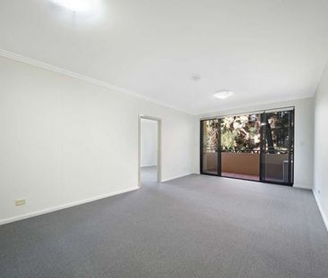 Generous home in prime central location - Photo 1