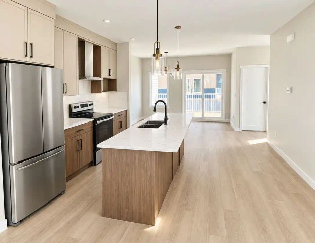 BRAND NEW NEVER LIVED IN 4 BEDROOM 3.5 BATHROOM WITH DOUBLE GARAGE — 4 Bedrooms Townhouse - Photo 1