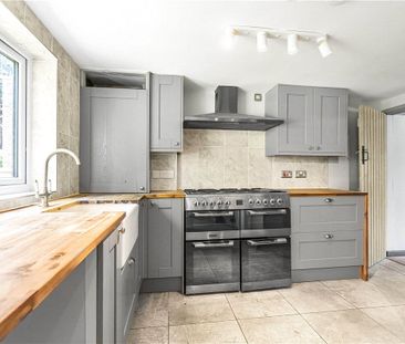 A three bedroom end terraced property situated within the Village o... - Photo 3