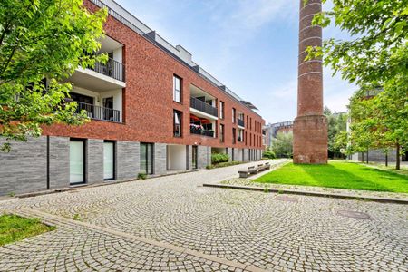 Recent 2 slpk appartement met ruim terras en autostaanplaats - Photo 3