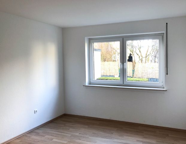 Gut geschnittene EG Wohnung mit Balkon und Garage - Foto 1