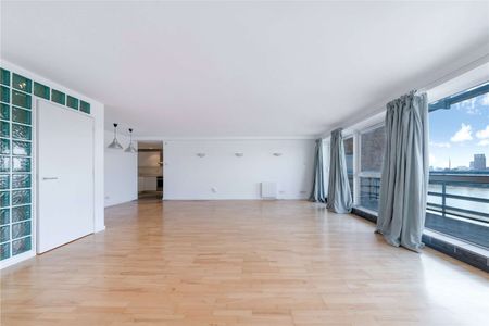 A two double bedroom duplex penthouse situated on the 6th and 7th floor of this charming gated riverside development located off Westferry Road. - Photo 2