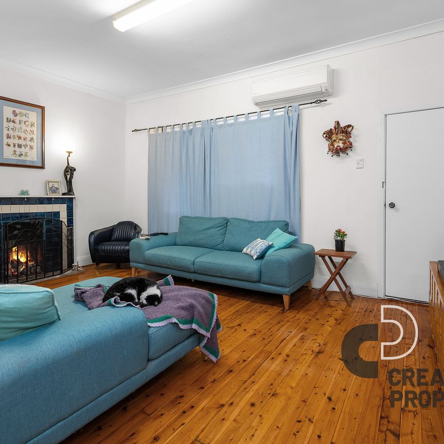 Central Home Packed with Positives! - Photo 1