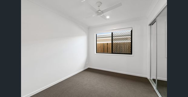 Stunning Family Home in Logan Reserve - Photo 1