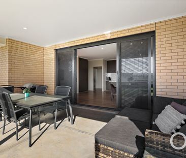 Open the door to spacious family living with dual living zones - Photo 2