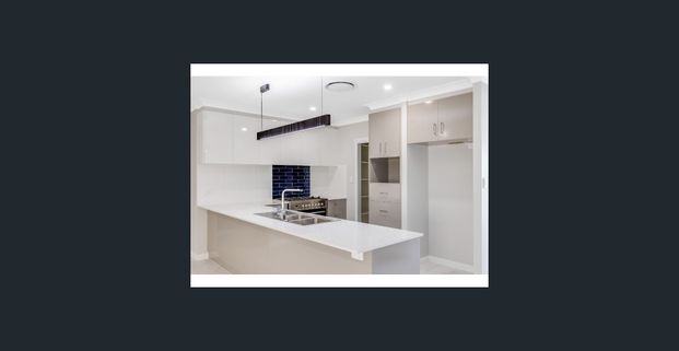 Spacious Five-Bedroom Family Home with Multiple Living Areas - Photo 1