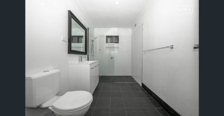 Lovely fresh home located in a central location just 350m from the lakes shore & 1km from the Swansea main shopping strip - Photo 5