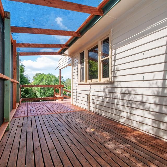 Charming Weatherboard Home in Prime Location - Photo 1