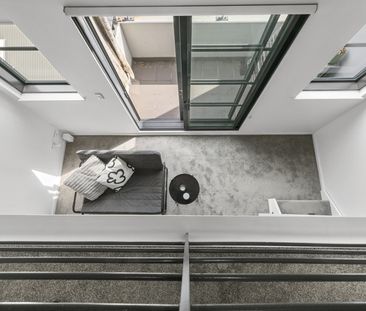 Dual-Level "Loft-Style" Apartment in Convenient Locale with Parking - Photo 2