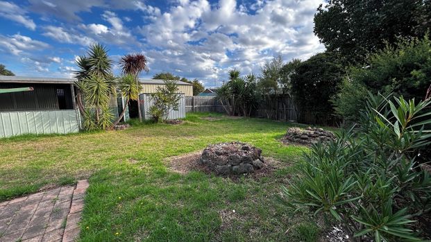 Freshly Painted, Neat Home in Fantastic Drysdale Location - Photo 1
