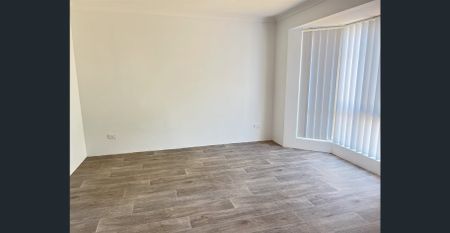 Welcome to 8 Olympus Rise, a beautifully 4-bedroom, 2-bathroom - Photo 5