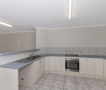 3 BEDROOM UNIT WITH FULLY FENCED YARD, AND GARAGE - Photo 4