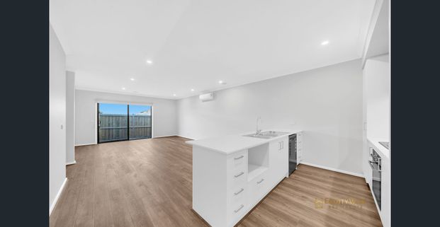 Spacious, Centrally Located with Club Access! - Photo 1