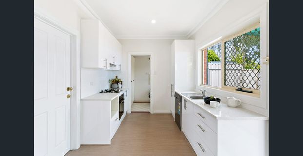 Modern 2 bedroom homette - Photo 1