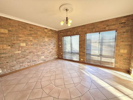 Spacious Family Home with Breathtaking Bushland Views and Flexible Living - Photo 3