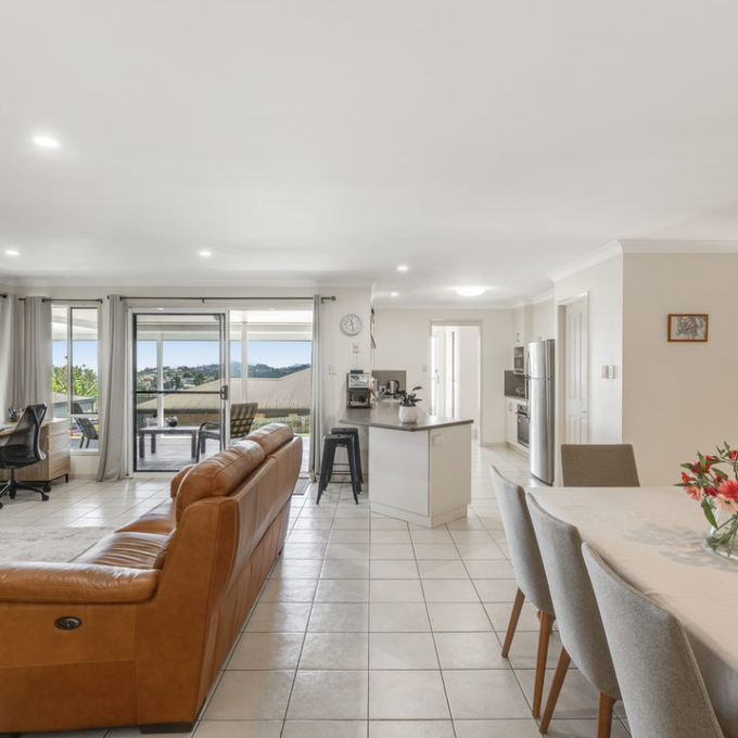 Spacious 4-Bedroom Home with Two Living Areas + Elevated Range Views - Photo 1